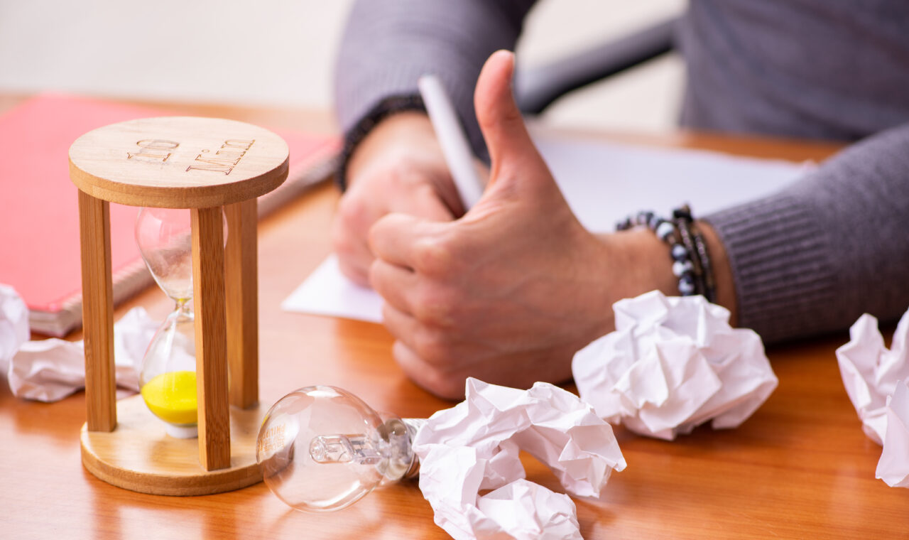 Male writer in time management concept